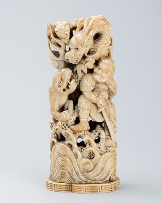 Lot 725 - A WALRUS TUSK OKIMONO OF A DRAGON, TIGER, AND SAMURAI