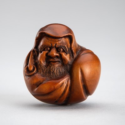 Lot 593 - NAOMASA: A WOOD NETSUKE OF DARUMA