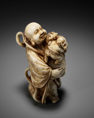 Lot 70 - RYOZAN: AN AMUSING IVORY NETSUKE OF HOTEI WITH WRESTLING ONI