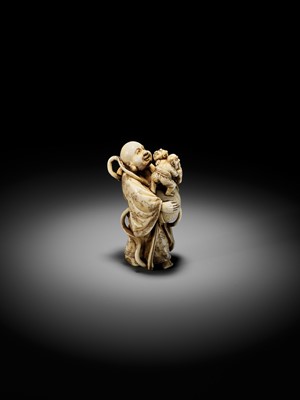 Lot 70 - RYOZAN: AN AMUSING IVORY NETSUKE OF HOTEI WITH WRESTLING ONI