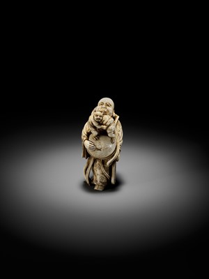 Lot 70 - RYOZAN: AN AMUSING IVORY NETSUKE OF HOTEI WITH WRESTLING ONI