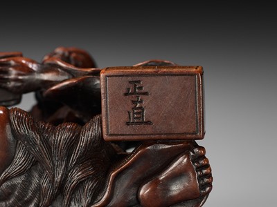 Lot 86 - MASANAO: A RARE WOOD NETSUKE DEPICTING THE TRANSFORMATION OF URASHIMA TARO