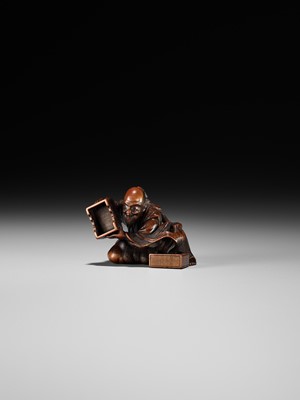 Lot 86 - MASANAO: A RARE WOOD NETSUKE DEPICTING THE TRANSFORMATION OF URASHIMA TARO