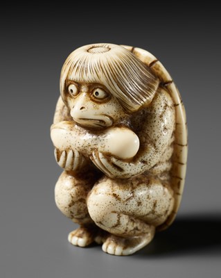 Lot 495 - AN AMUSING WALRUS TUSK NETSUKE OF A KAPPA HOLDING A CUCUMBER