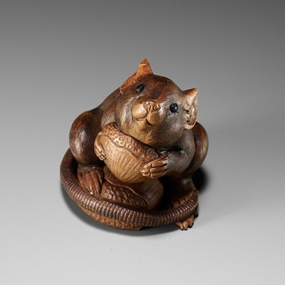 Lot 417 - SHINICHI: A WOOD NETSUKE OF A RAT WITH CHESTNUTS