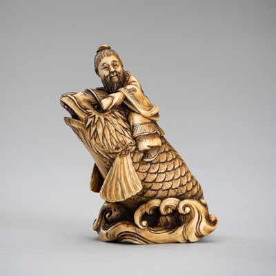 Lot 472 - RYUGETSU: AN IVORY NETSUKE OF KINKO SENNIN ON A CARP, MEIJI