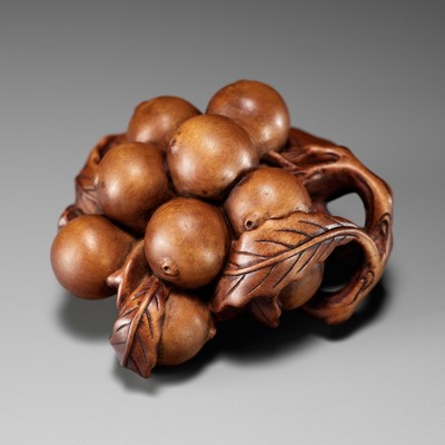 Lot 524 - A FINE WOOD NETSUKE OF A BIWA CLUSTER