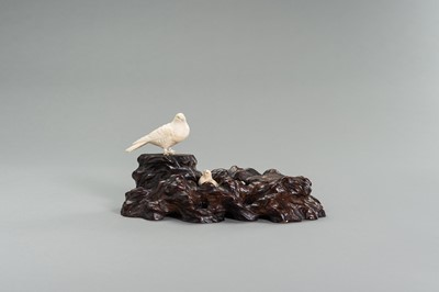 Lot 262 - A BONE OKIMONO GROUP OF A COUPLE OF BIRDS WITH CHICKS