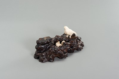 Lot 262 - A BONE OKIMONO GROUP OF A COUPLE OF BIRDS WITH CHICKS