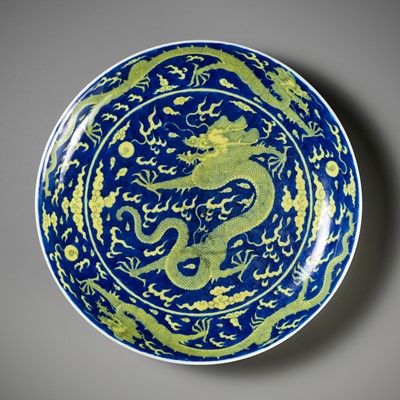 Lot 157 - AN UNDERGLAZE-BLUE AND YELLOW-GLAZED ‘DRAGON’ DISH, QIANLONG MARK AND PERIOD