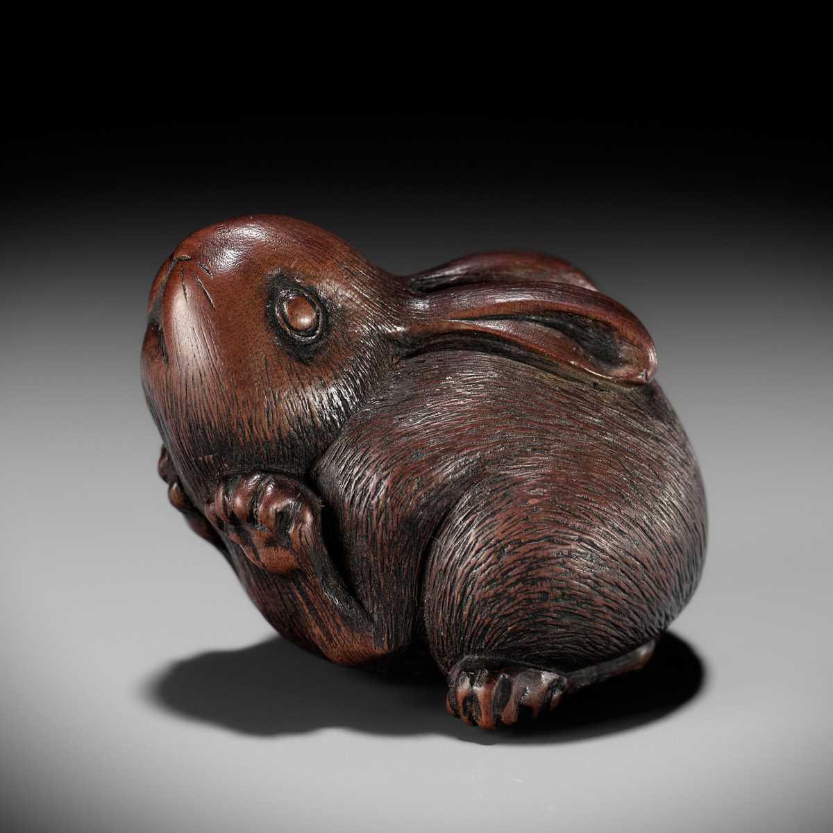 Hare Rabbit Netsuke Lot 111 - AZAN: A SUPERB WOOD NETSUKE OF A CHUBBY HARE