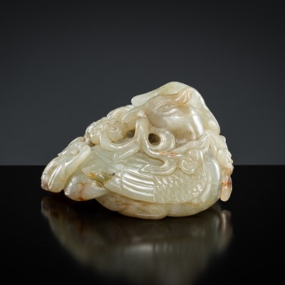 Lot 441 - A PALE CELADON AND RUSSET JADE CARVING DEPICTING A PAIR OF MANDARIN DUCKS, LATE MING DYNASTY