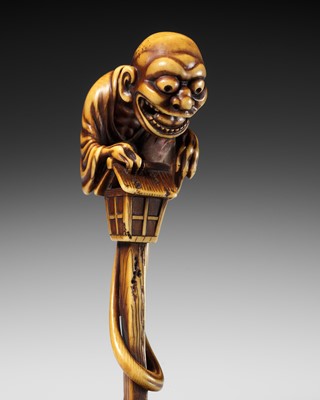 Lot 68 - HIDEMASA: A SUPERB AND LARGE IVORY NETSUKE OF THE BAKEMONO MIKOSHI NYUDO