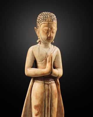 Lot 278 - A RARE IVORY FIGURE OF SARIPUTRA, THAILAND, 1750-1850