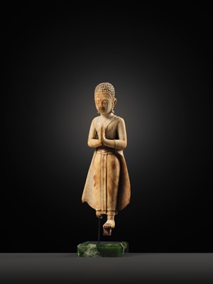 Lot 278 - A RARE IVORY FIGURE OF SARIPUTRA, THAILAND, 1750-1850