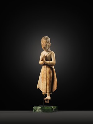 Lot 278 - A RARE IVORY FIGURE OF SARIPUTRA, THAILAND, 1750-1850