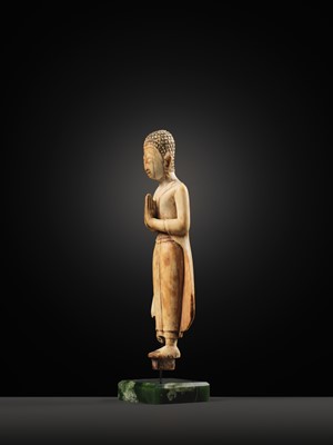 Lot 278 - A RARE IVORY FIGURE OF SARIPUTRA, THAILAND, 1750-1850