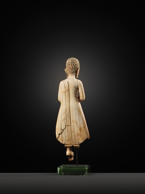 Lot 278 - A RARE IVORY FIGURE OF SARIPUTRA, THAILAND, 1750-1850