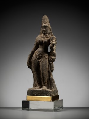 Lot 238 - A GRANITE FIGURE OF PARVATI, CHOLA PERIOD