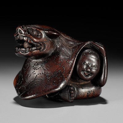 Lot 160 - MIWA: A FINE WOOD NETSUKE OF A BOY AT SHISHIMAI