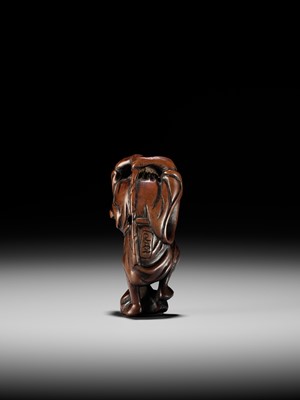 Lot 21 - A RARE AND EARLY WOOD NETSUKE OF KOSHOHEI