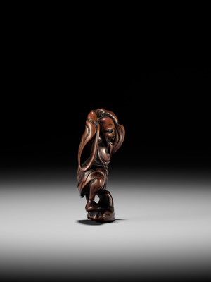 Lot 21 - A RARE AND EARLY WOOD NETSUKE OF KOSHOHEI