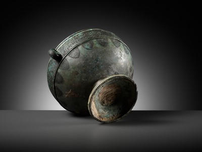 Lot 64 - AN ARCHAIC BRONZE RITUAL FOOD VESSEL AND COVER, DOU, WITH ELEVEN BANDS OF DECORATION, LATE SPRING AND AUTUMN TO EARLY WARRING STATES PERIOD