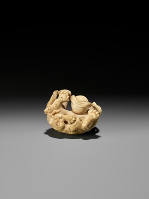 Lot 47 - HAKURYU: A FINE IVORY NETSUKE OF A SHISHI AND YOUNG