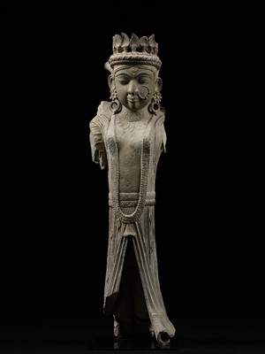 Lot 261 - A SANDSTONE ARCHITECTURAL BRACKET DEPICTING A GANDHARVA, WESTERN INDIA, 17TH-18TH CENTURY OR EARLIER