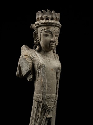 Lot 261 - A SANDSTONE ARCHITECTURAL BRACKET DEPICTING A GANDHARVA, WESTERN INDIA, 17TH-18TH CENTURY OR EARLIER