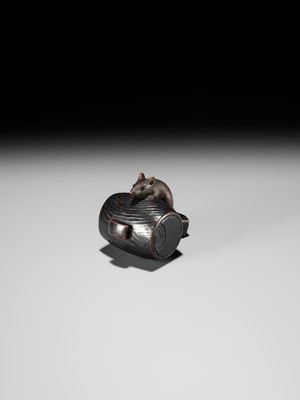 Lot 81 - A WOOD NETSUKE OF A RAT ON DAIKOKU’S MALLET