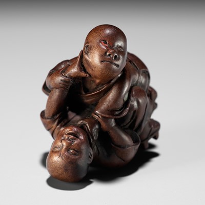 Lot 162 - MIWA: A FINE WOOD NETSUKE OF TWO BLIND MEN FIGHTING