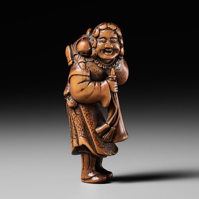 Lot 552 - A FINE WOOD NETSUKE OF A DUTCHMAN WITH A CHILD