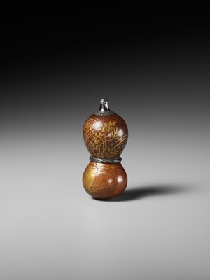 A FINE AND LARGE LACQUERED GOURD NETSUKE WITH A CHUBBY HARE AMONGST AUTUMN GRASSES