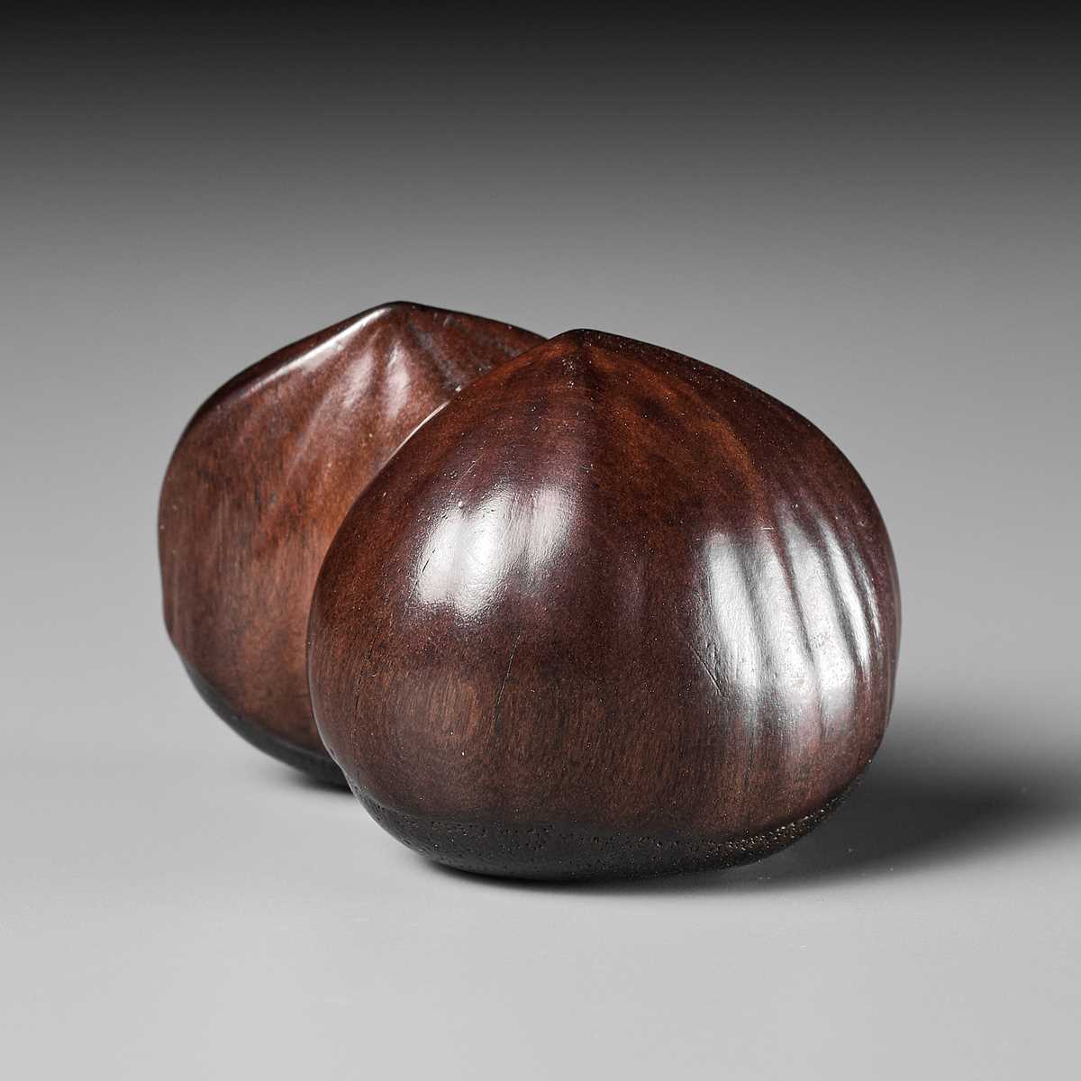 Lot 184 - MASAKAZU: A FINE NAGOYA SCHOOL WOOD NETSUKE OF TWO CHESTNUTS