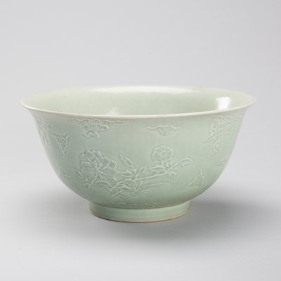 Lot 945 - A PALE CELADON ‘AUSPICIOUS FLOWERS’ PORCELAIN BOWL, 1900s