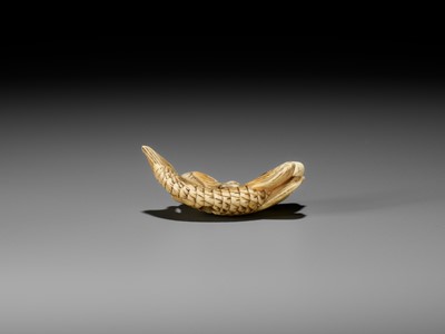 Lot 1 - YOSHITSUGU: AN EARLY IVORY NETSUKE OF KINKO SENNIN ON A CARP