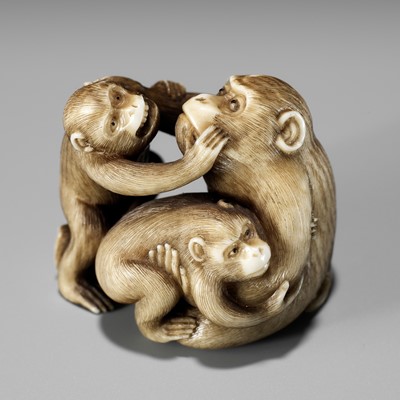 Lot 176 - IKKOSAI: A FINE IVORY NETSUKE OF A MONKEY WITH TWO YOUNG