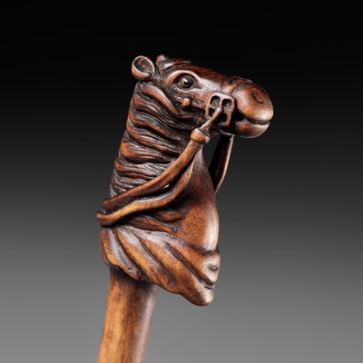 Lot 455 - MASANAO: A FINE WOOD SASHI NETSUKE OF A HOBBY HORSE