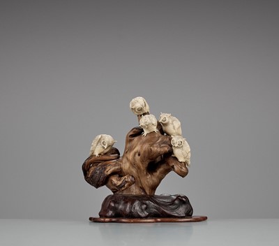 Lot 235 - GYOKUSEN: A CHARMING BONE AND WOOD OKIMONO OF OWLS IN A TREE