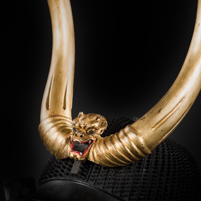 A RARE AND IMPRESSIVE GOLD-LACQUERED WOOD MAEDATE WITH DEMON AND HORNS