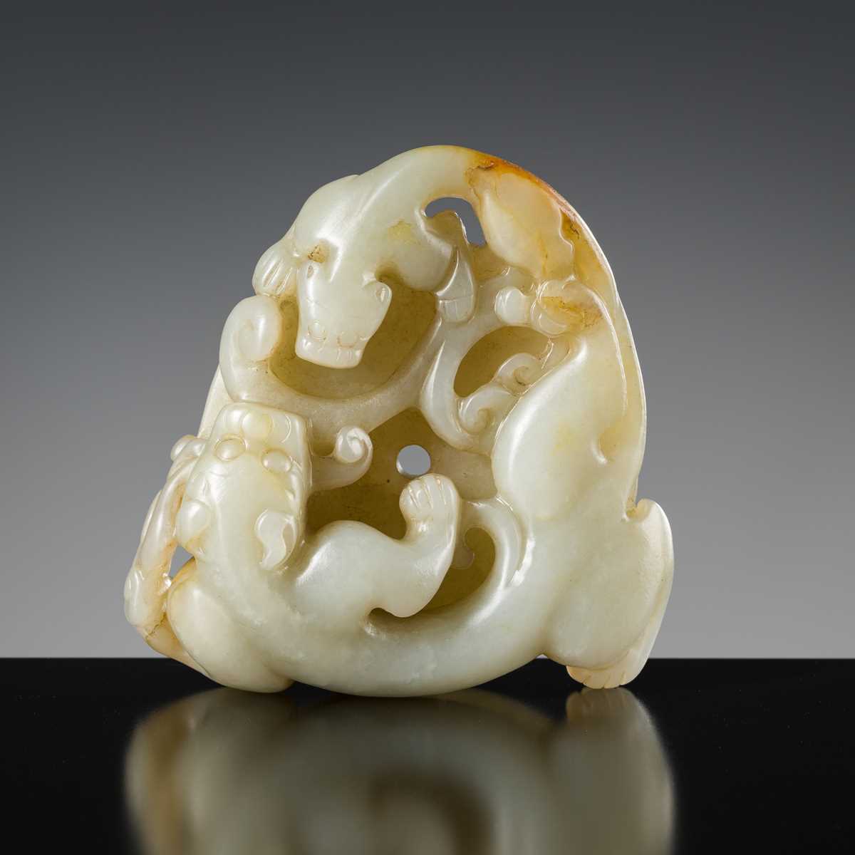 Lot 175 - A PALE CELADON AND RUSSET JADE ‘CHILONG AND YOUNG WITH LINGZHI’ BI DISK, 18TH-19TH CENTURY