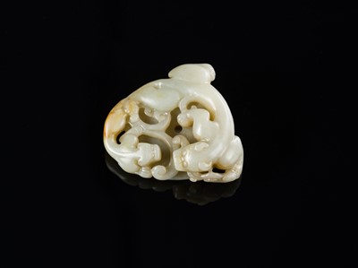 Lot 175 - A PALE CELADON AND RUSSET JADE ‘CHILONG AND YOUNG WITH LINGZHI’ BI DISK, 18TH-19TH CENTURY