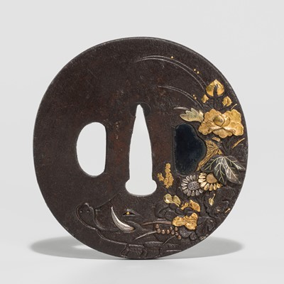 Lot 232 - A FINE IRON TSUBA DEPICTING A BOAR AMONGST AUTUMN GRASSES