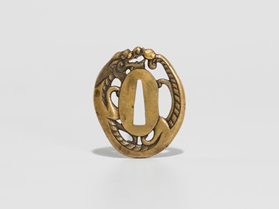 Lot 228 - A FINE YOSHIYUKI SCHOOL SENTOKU TSUBA IN THE FORM OF A DRAGON