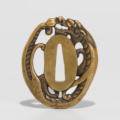 Lot 228 - A FINE YOSHIYUKI SCHOOL SENTOKU TSUBA IN THE FORM OF A DRAGON