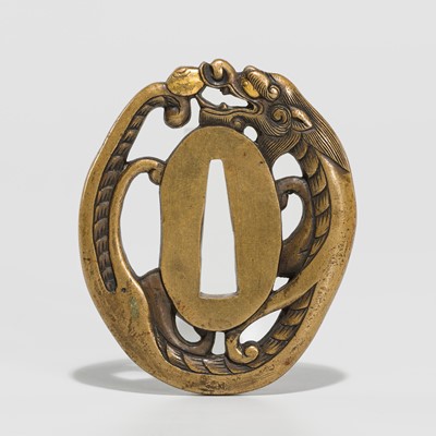 Lot 228 - A FINE YOSHIYUKI SCHOOL SENTOKU TSUBA IN THE FORM OF A DRAGON