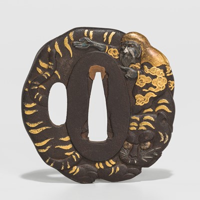 Lot 192 - A FINE IRON TSUBA OF BUKAN SENNIN WITH HIS TIGER