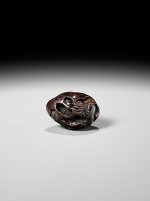 NAITO TOYOMASA: A FINE WOOD NETSUKE OF A DRAGON EMERGING FROM AN EGG