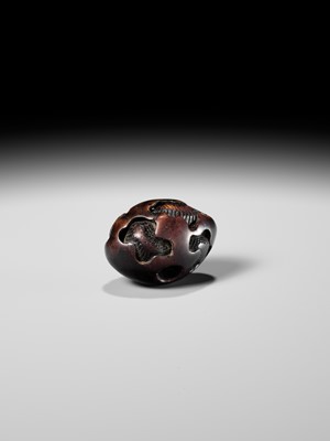 NAITO TOYOMASA: A FINE WOOD NETSUKE OF A DRAGON EMERGING FROM AN EGG